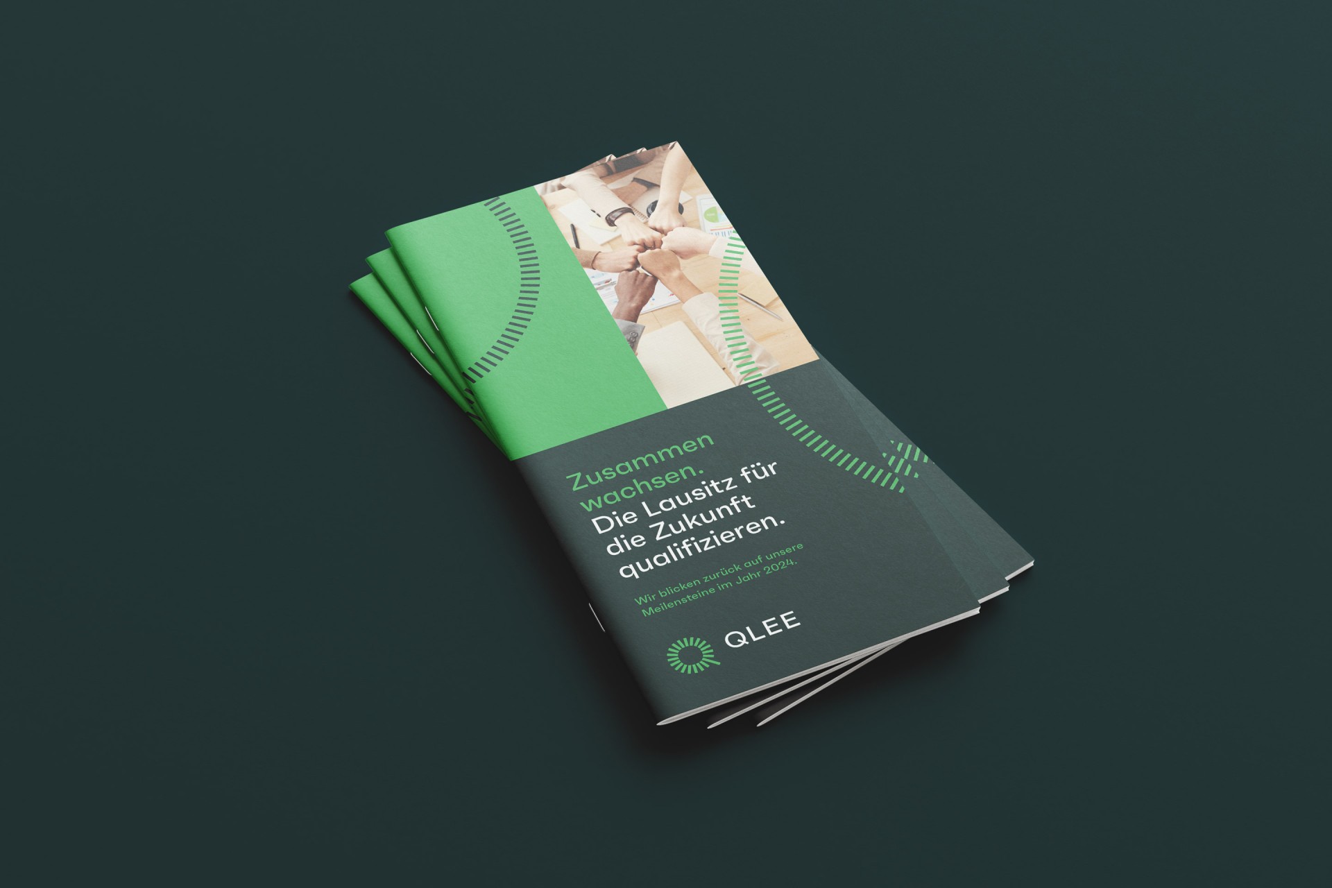 Broschüren im Format DIN Lang als Beispiel für die gedruckte Projektkommunikation von QLEE.